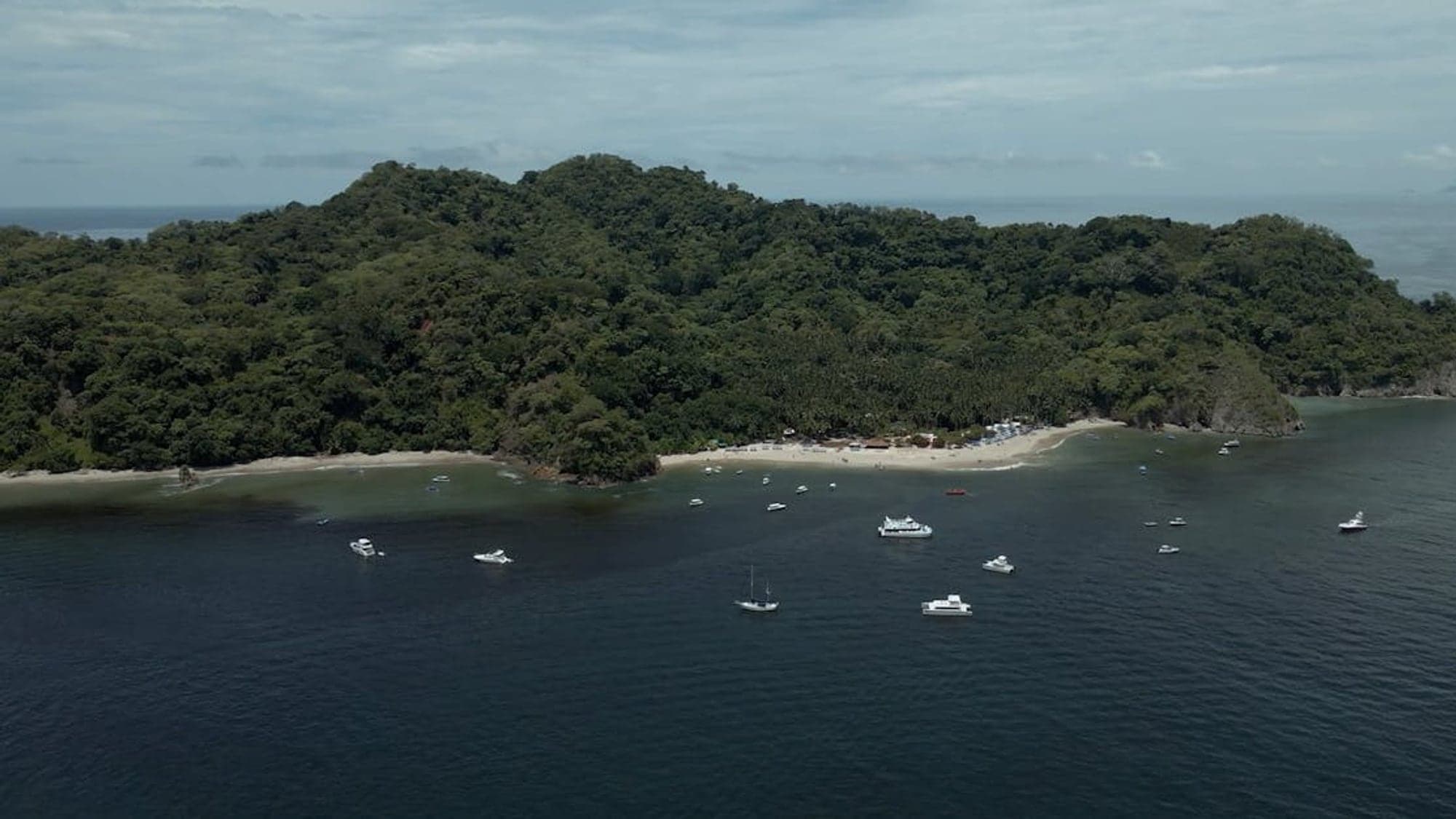 Snorkelers in turquoise water off Tortuga Island, Costa Rica