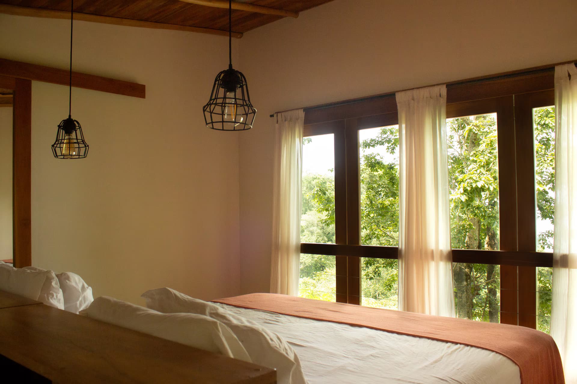 Wooden shutters and tropical foliage detail
