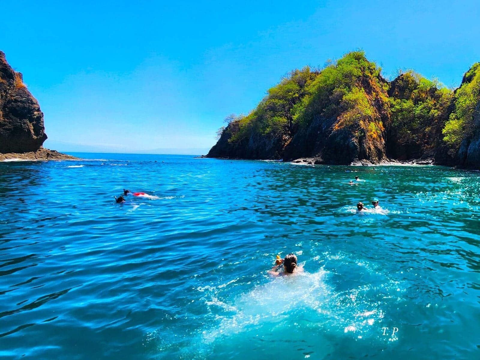 Tortuga Island Boat Tour — Half-day · snorkel · lunch on a beach